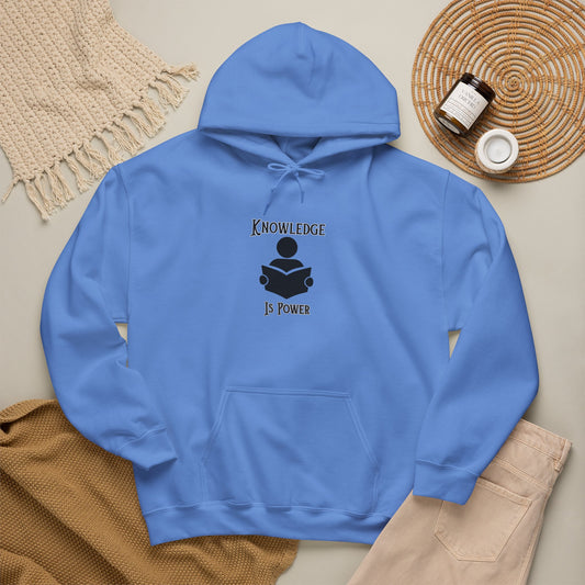 A Carolina blue pullover hoodie and kangaroo pocket with a black graphic silhouette image of a person holding an open book located between the words 'KNOWLEDGE IS POWER.'