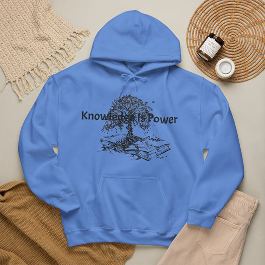 A Carolina blue pullover hoodie with a kangaroo pocket and blue drawstrings, featuring a black graphic of a tree growing from stacked books with the words 'Knowledge is Power.' 